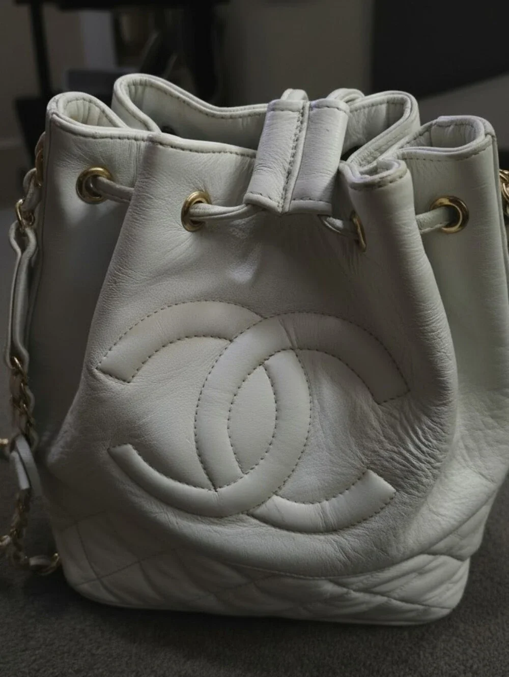 CHANEL Cream Quilted Leather Drawstring Bucket Bag with Chain Strap